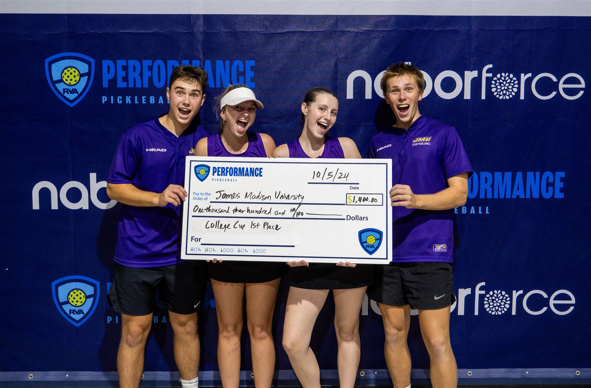 The JMU team celebrating a win together